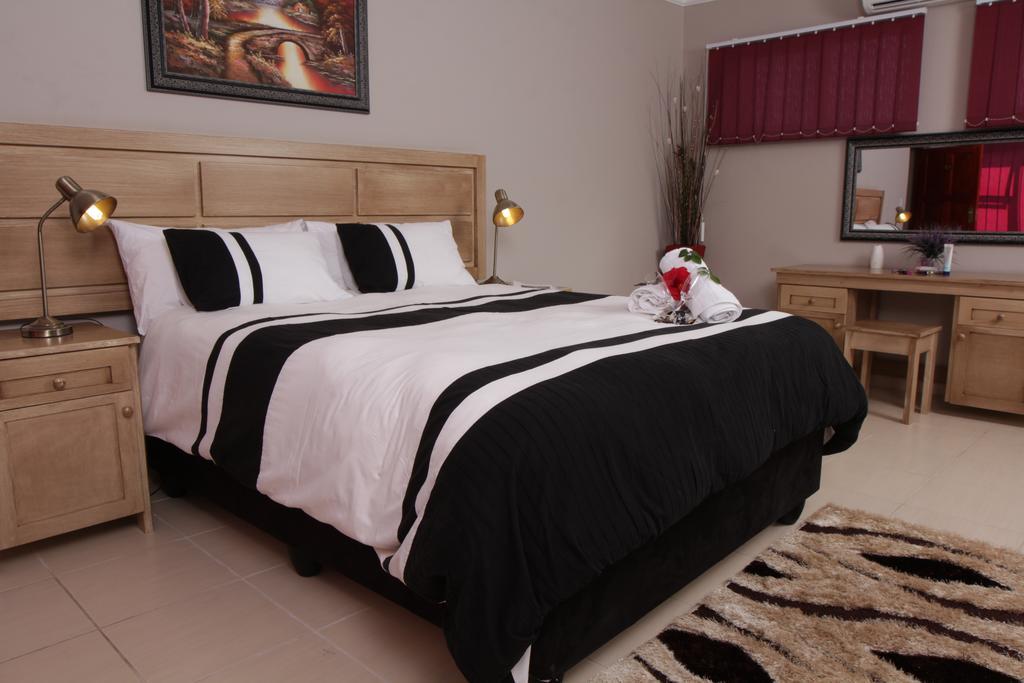 Casa Bianca Guest Lodge Hartbeespoort Værelse billede